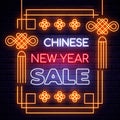 Illuminated neon signs chinese holiday light electric banner glowing on black brickwall