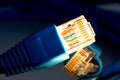 Illuminated network plug Royalty Free Stock Photo