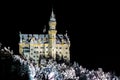 Illuminated Neuschwanstein castle in a winter night