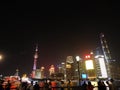 Illuminated Night Scene People on The Bund looking at Oriental Pearl TV Tower Lujiazui, Pudong, Shanghai, China Royalty Free Stock Photo