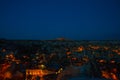 Illuminated at night streets of Goreme, Turkey, Cappadocia. The famous center of flight balloons. Amazing night landscape