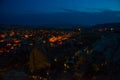 Illuminated at night streets of Goreme, Turkey, Cappadocia. The famous center of flight balloons. Amazing night