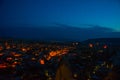 Illuminated at night streets of Goreme, Turkey, Cappadocia. The famous center of flight balloons. Amazing night