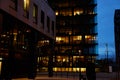 Illuminated Office Building Against Twilight Sky