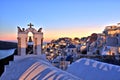 Illuminated Oia Village at Sunset on Santorini Island Royalty Free Stock Photo