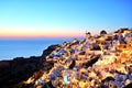 Illuminated Oia Village at Sunset on Santorini Island Royalty Free Stock Photo