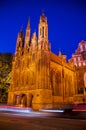 Illuminated old gothic Church in old Town at night Royalty Free Stock Photo