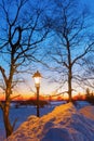 Illuminated old street lamp in winter landscape Royalty Free Stock Photo