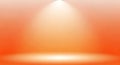 Illuminated orange and yellow gradient stage spotlight effect with subtle floor reflection Royalty Free Stock Photo