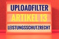 Illuminated panel with the german words Uploadfilter Artikel 13 Leistungsschutzrecht in english Upload filter Article 13 ancillary Royalty Free Stock Photo