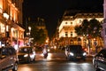 illuminated paris road in the middle of the night