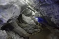 Illuminated passage in the Ice Cave in Kungur, Russia