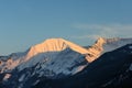 Illuminated peaks of austrian mountain