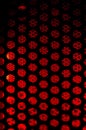 Illuminated perforated sheet metal close up Royalty Free Stock Photo