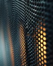 Illuminated perforations Abstract textural play of light through a metal grid Royalty Free Stock Photo