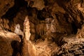 Illuminated picturesque karst rock formations in Balcarka Cave, Moravian Karst, Czech: Moravsky Kras, Czech Republic Royalty Free Stock Photo