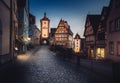 Illuminated Plonlein Square with Siebersturm and Kobollzell Gate in Rothenburg ob der Tauber, Bavaria, Germany