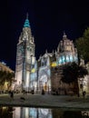 The illuminated Primate Cathedral of Saint Mary in Toledo at night, Spain