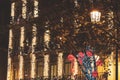 Illuminated red balls, tree lights and christmas building decorations in Lisbon, Portugal Royalty Free Stock Photo