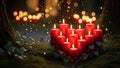 Illuminated Red Candles in Forest Royalty Free Stock Photo