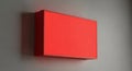 Illuminated red rectangular light box display against a gray wall backdrop Royalty Free Stock Photo