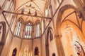 Illuminated Roman Catholic Church with Stained Glass Windows