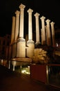 Illuminated roman temple at night