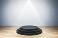 Illuminated round black pedestal