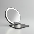 Illuminated Round Makeup Mirror in Compact Case on White Background in Studio Royalty Free Stock Photo