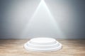 Illuminated round white pedestal