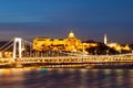 Illuminated Royal Buda Castle above Danube River by night in Budapest, Hungary, Europe. UNESCO World Heritage Site Royalty Free Stock Photo