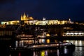 Illuminated Saint Vitus Cathedral, Hradcany Castle And River Moldova In The Night In Prague In The Czech Republic Royalty Free Stock Photo