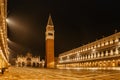 Illuminated San Marco square with Basilica of Saint Mark and Bell Tower at night,Venice,Italy.Late evening at popular tourist Royalty Free Stock Photo