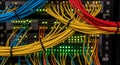 Illuminated Network Server Rack with Colorful Cables in Data Center Hardware Infrastructure for Telecommunication Royalty Free Stock Photo