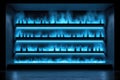 Illuminated shelves with blue neon bottles in a dark room Royalty Free Stock Photo