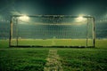 Illuminated Soccer Goal Post and Net at Night in Empty Stadium with Vibrant Grass Field and Stadium Lights Royalty Free Stock Photo