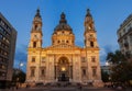 Lluminated St. Stephen`s Basilica on St. Stephen`s square evening shot in Pest part of Budapest, Hungary