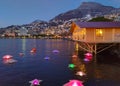 Illuminated stars on the Geneva lake at Christmas time. Romantic view of Montreux at the sunset Royalty Free Stock Photo