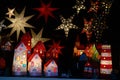 Illuminated stars and paper houses on Christmas fair, Germany Royalty Free Stock Photo