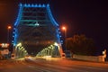 Blue story bridge lights and traffic by night