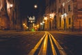 Illuminated street at night. Old european city Royalty Free Stock Photo