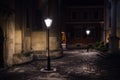 Illuminated street at night. Old european city Royalty Free Stock Photo