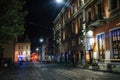 Illuminated street of Old Town at night, Lviv, Ukraine. Royalty Free Stock Photo