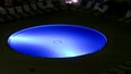 Illuminated swimming pool at night Royalty Free Stock Photo