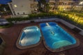 illuminated swimming pools at night Royalty Free Stock Photo