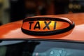 Illuminated taxi sign of a London taxi