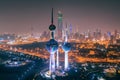 Illuminated towers with cityscape view while Kuwait City celebrating the national day