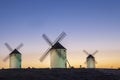 Illuminated traditional windmills at rising Royalty Free Stock Photo