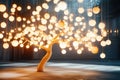 Illuminated tree with hanging light bulbs in a modern artistic installation Royalty Free Stock Photo