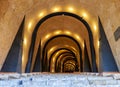 An illuminated Tunnel entrance to the St James Cavalier Centre f